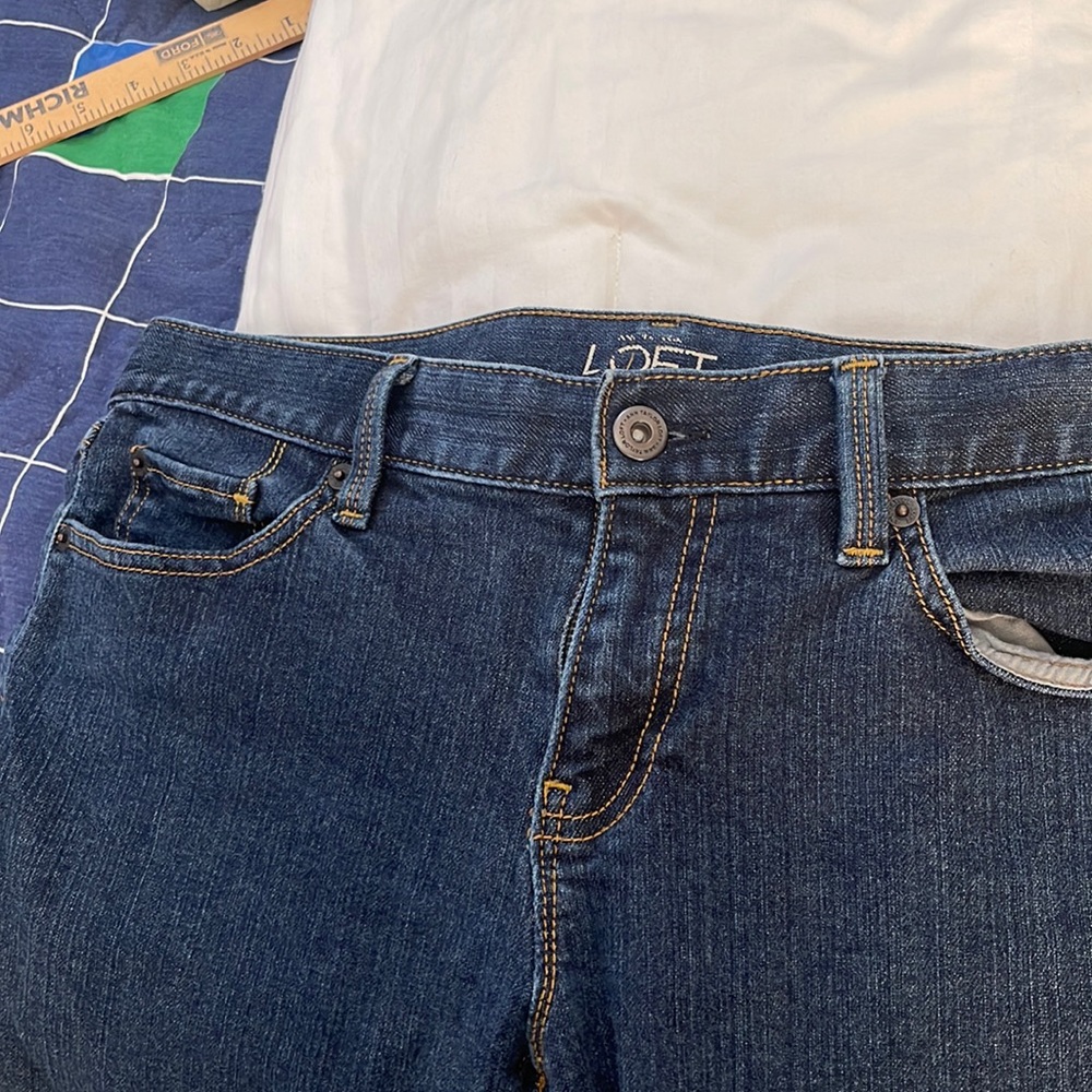 Ann Taylor loft dark blue jeans. In good shape flattering,cut above muffin top